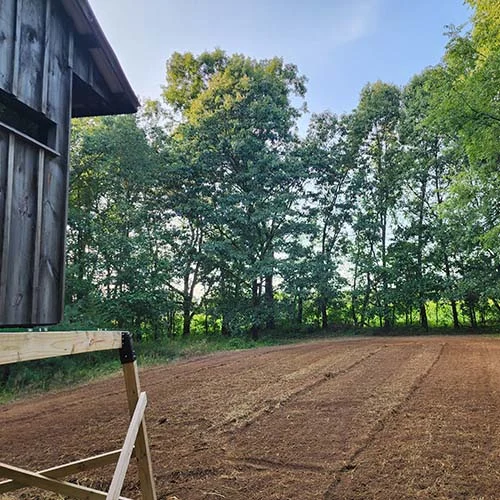 Tilled-Food-Plot-with-Elevated-Hunting-Blind.webp