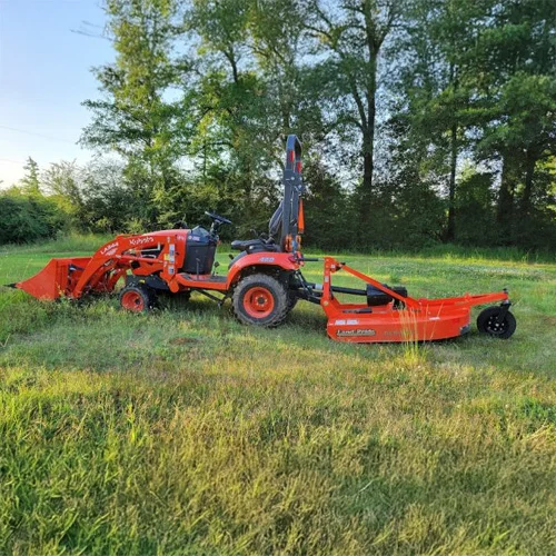 Utility-tractor-ith-brush-hog-mowing-deck.webp